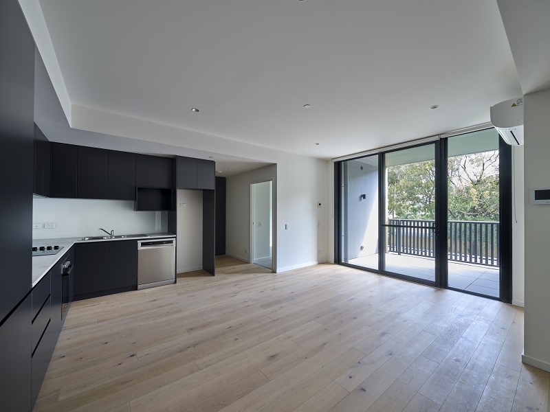 Image of indoor area with modern kitchen, meal and family area